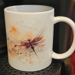 12 Oz. Coffee mug with a watercolor dragonfly design.